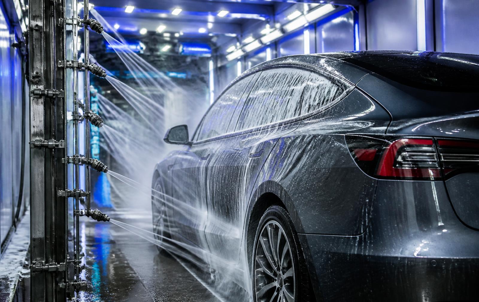 A vehicle inside the Genius touchless wash tunnel