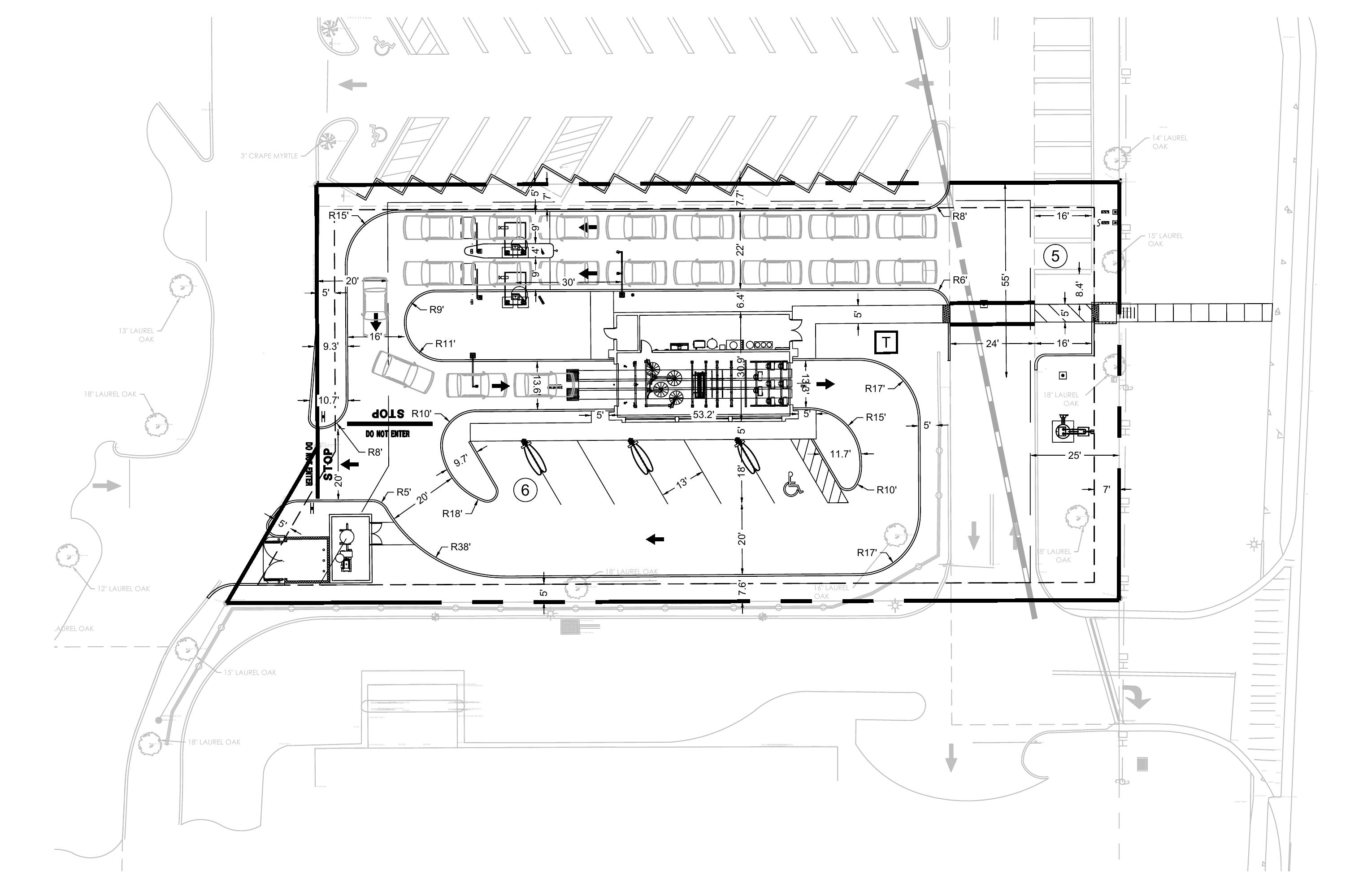 Genius Car Wash real site plan with tunnel layout, stacking lanes, and vacuum bays